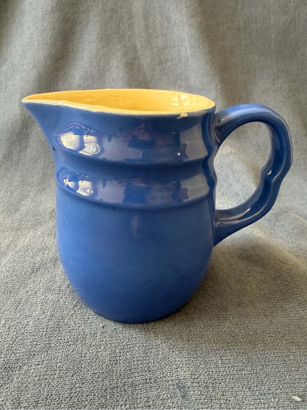 Blue Stoneware Ceramic Pitcher with Yellow Interior Glaze